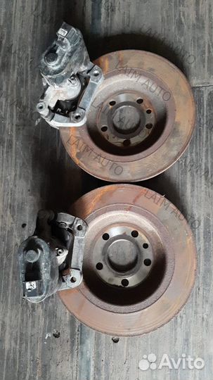 Суппорт задний в сборе с колодками Volvo