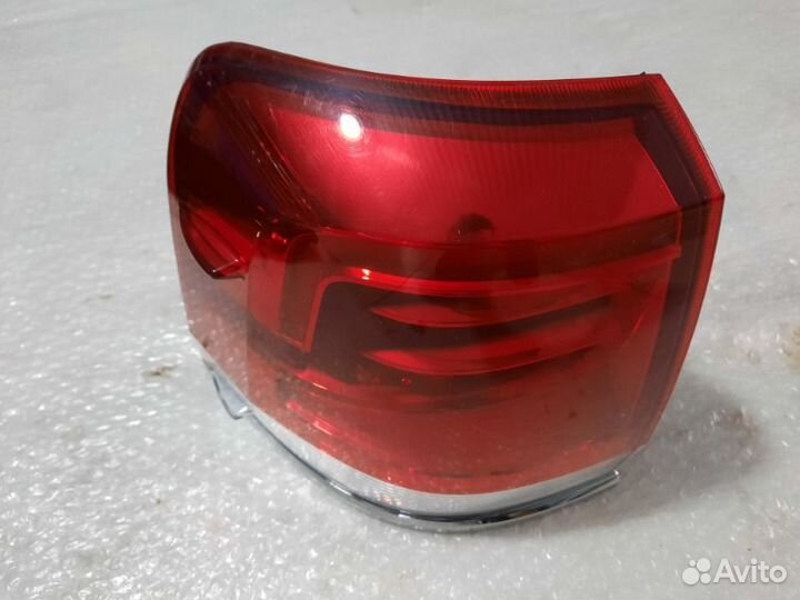 Фонарь наружный задний левый Тoyota Land Cruiser