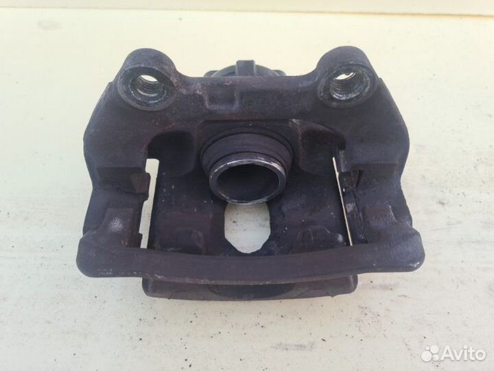 Суппорт задний левый Chevrolet Trailblazer