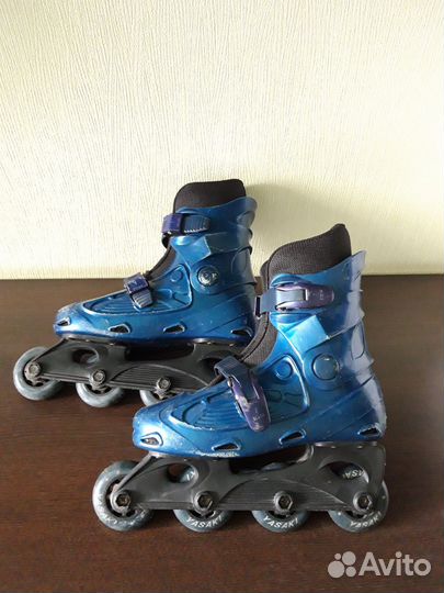 Роликовые коньки