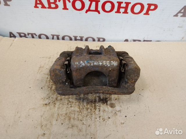 Суппорт тормозной задний левый Hyundai Santa Fe