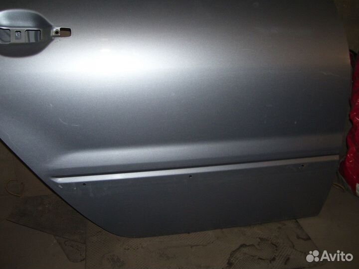 Митсубиси ланцер 9 дверь задняя