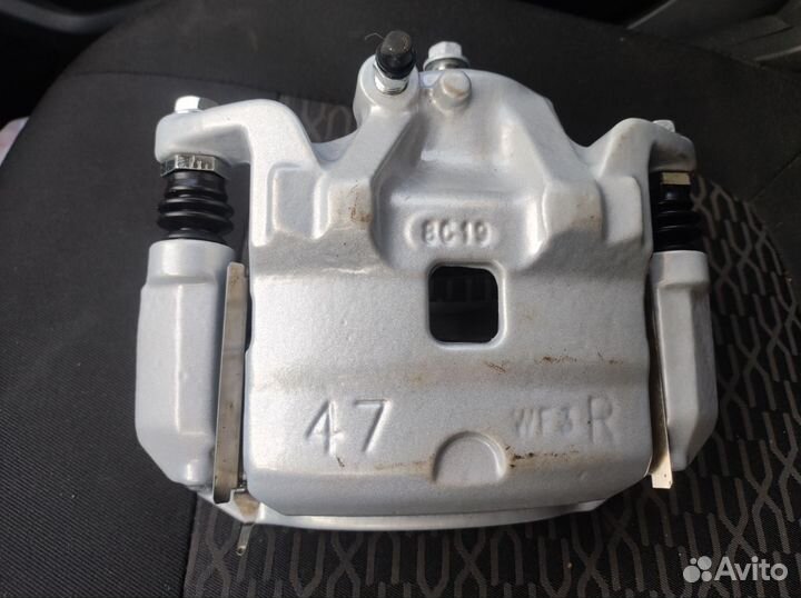 Суппорта передние Nissan tiida