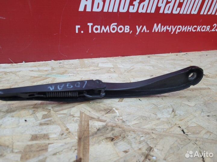 Поводок дворника передний левый Renault Logan