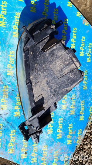 Фара левая Mazda Demio DY3W DY5W 2004