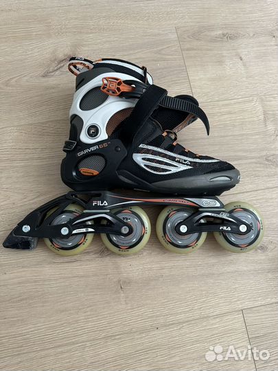 Роликовые коньки