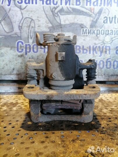 Суппорт задний левый Opel Insignia 1 (2008-2013)