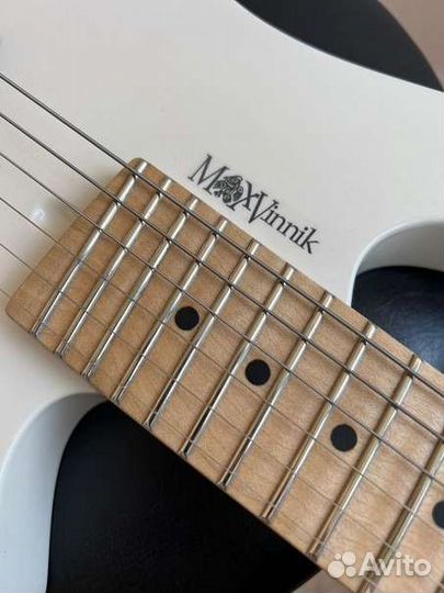 Travel guitar by Max Vinnik Gravity2