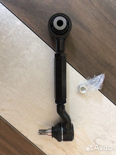 Задний верхний развальный регулируемый рычаг