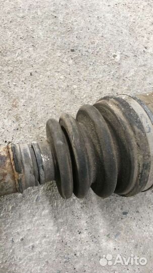 Полуось передняя левая (приводной вал, шрус) Mazda