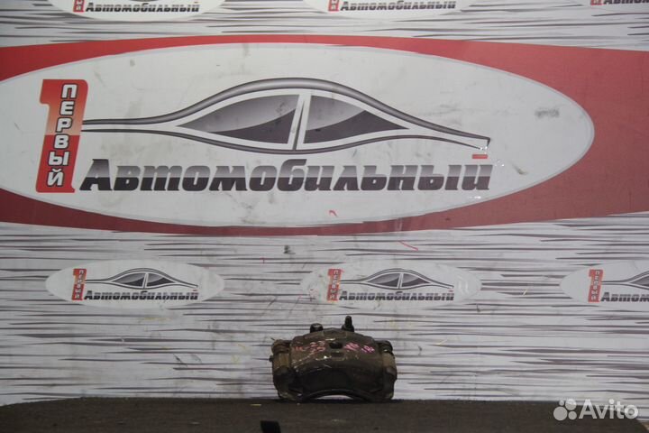 Суппорт перед лево c Nissan Wingroad WRY11 QR20DE