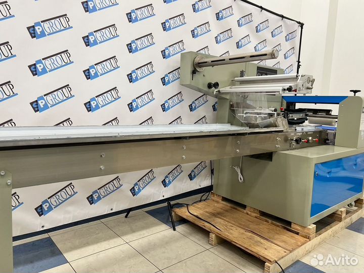 Горизонтальный упаковщик 600(флоупак) с верхней п