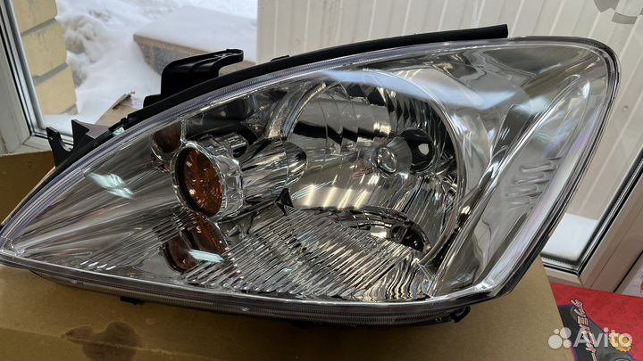 Фара mitsubishi lancer 03-07