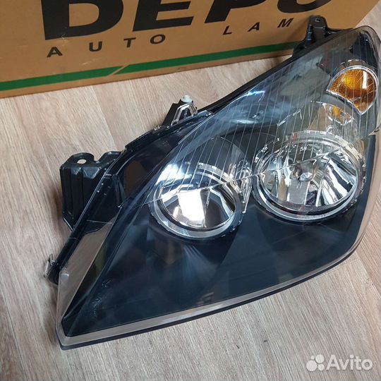 Фара левая Opel Astra H