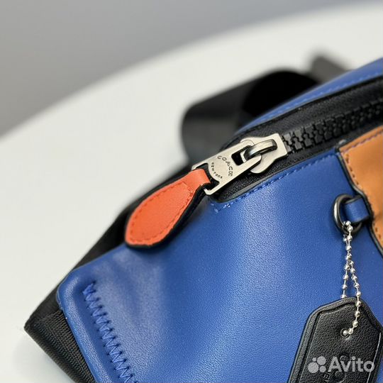 Поясная сумка Coach из канвы и кожи