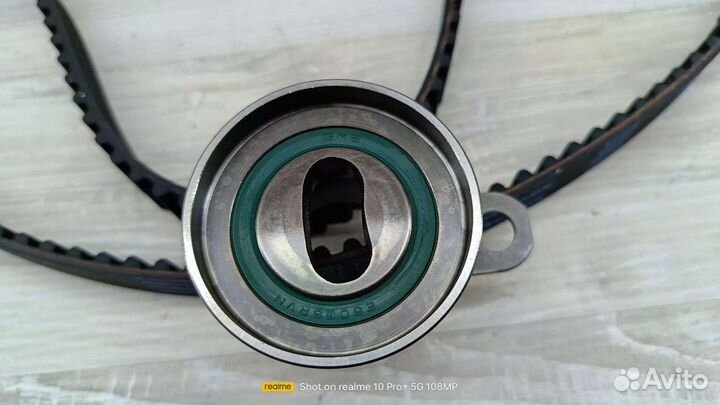 Ремень грм +Ролик Geely Мк