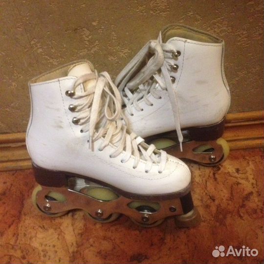 Роликовые коньки