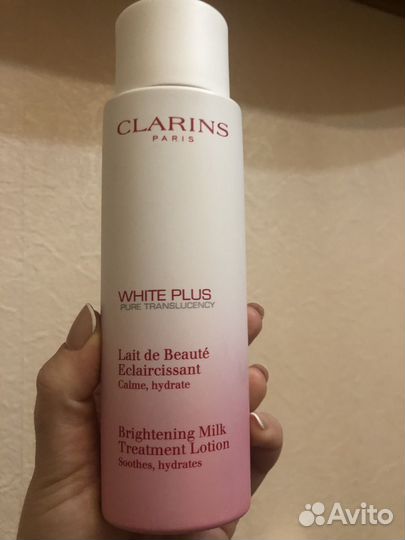 Clarins осветляющее молочко для лица