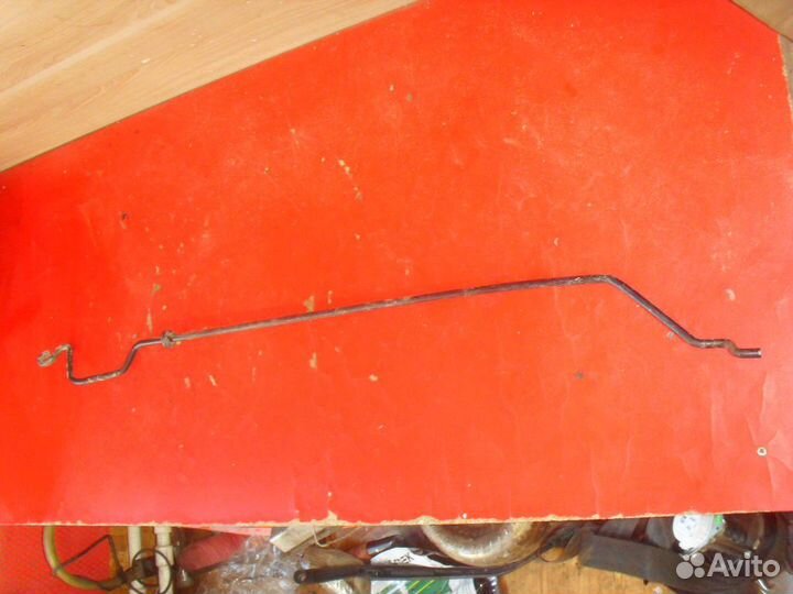 Держатель капота 65771AV600 Nissan Primera (P12)