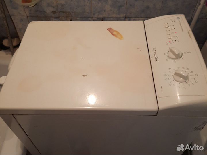 Стиральная машина с вертикальной загрузкой