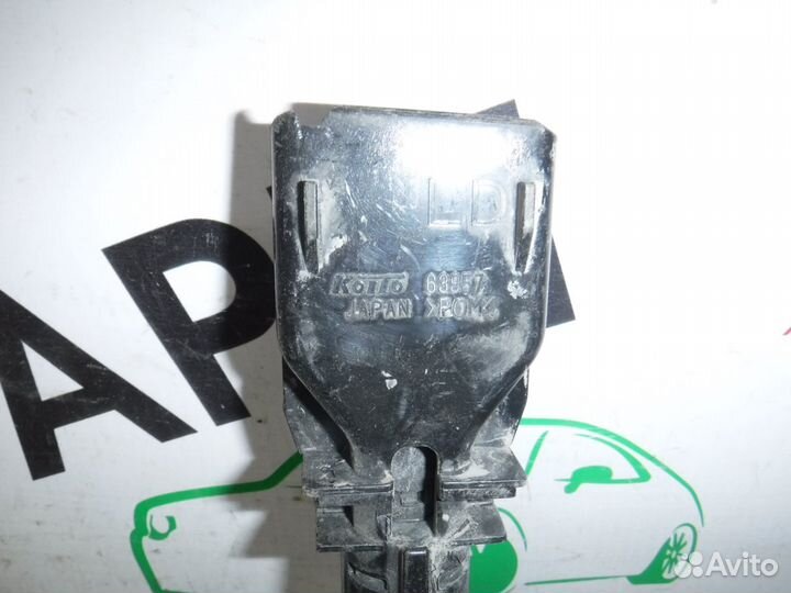 Форсунка омывателя фары правая Infiniti QX70 FX 51