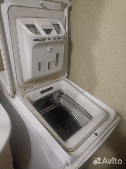 Стиральная машина с вертикальной загрузкой