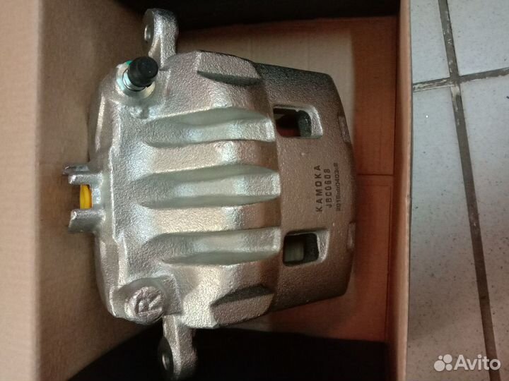 Суппорт передний Subaru 26292-AE160