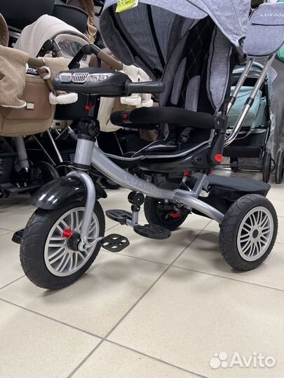 Трехколесный велосипед с поворотным сиденьем