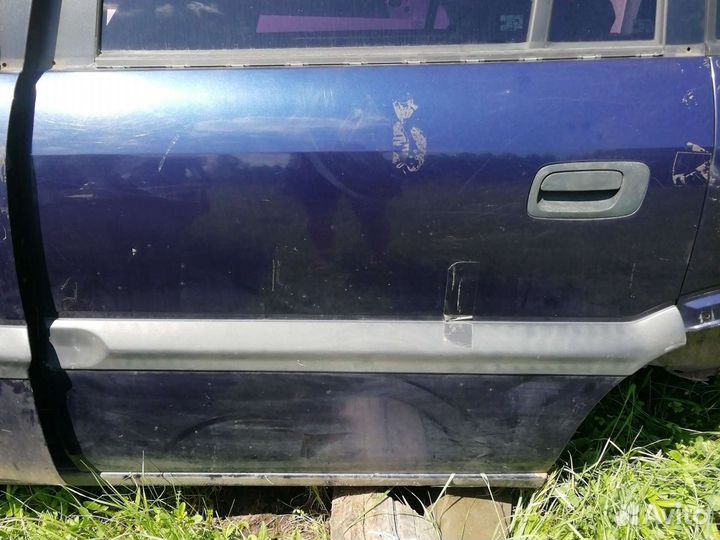 Дверь задняя левая зафира а