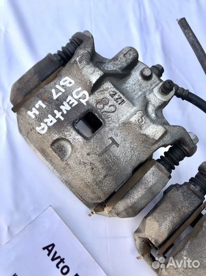 Nissan Sentra b17 суппорт передний тормозной