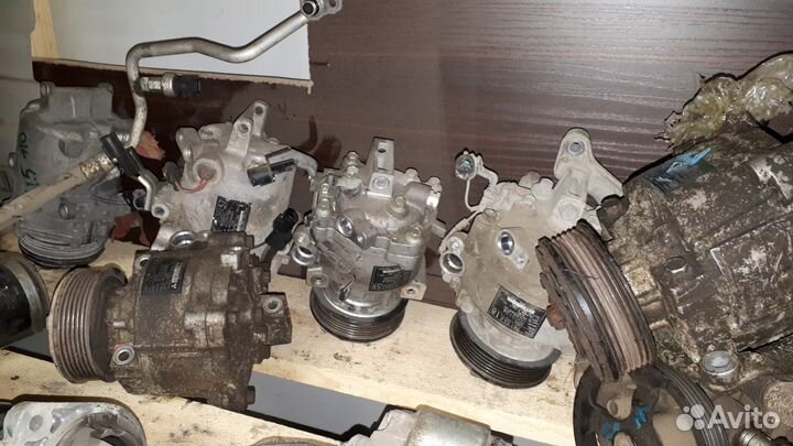 Компрессор кондиционера Mitsubishi Lancer