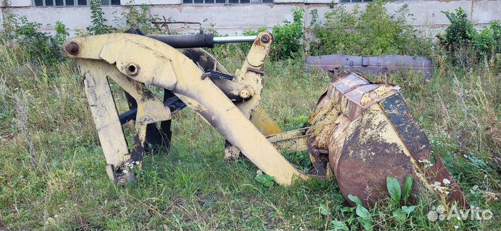 Фронтальный погрузчик на т150к