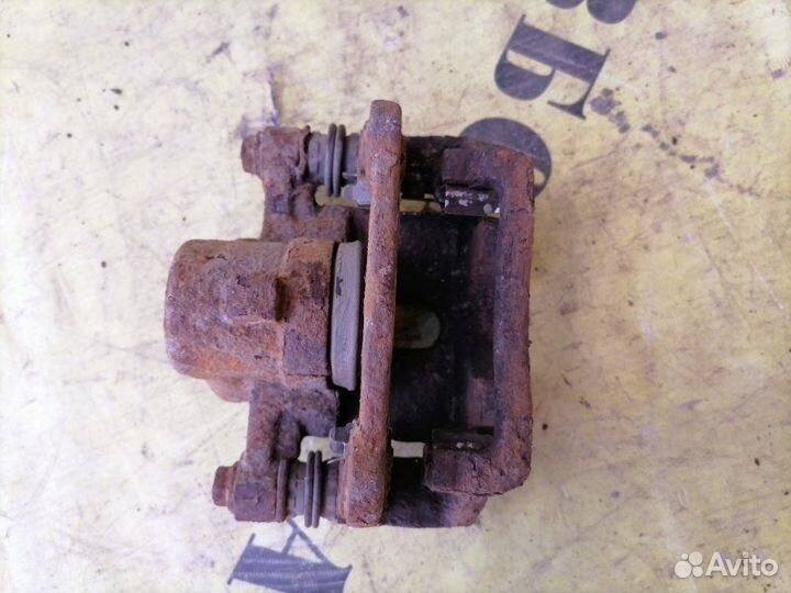 Суппорт задний левый Toyota Corolla 120 2001-2006