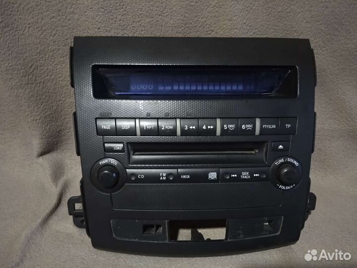 Панель магнитолы Mitsubishi Outlander XL