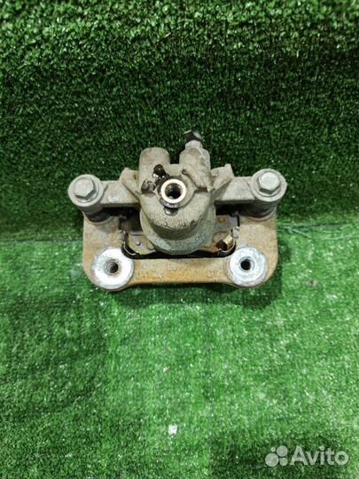 Суппорт тормозной задний левый Kia Ceed хэтчбек