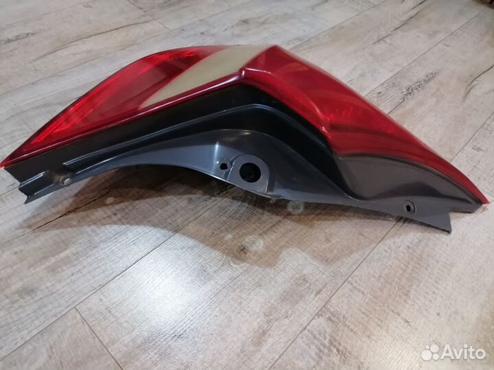 Левый задний фонарь Хундай Солярис хэтчбек