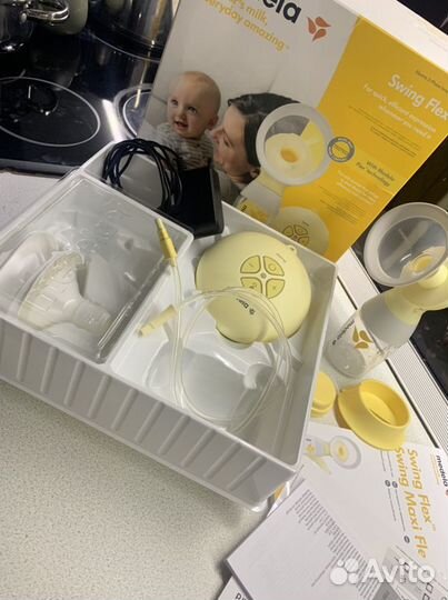 Молокоотсос medela swing flex электрический