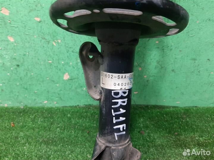 Стойка амортизатора передняя левая Honda Jazz 2004