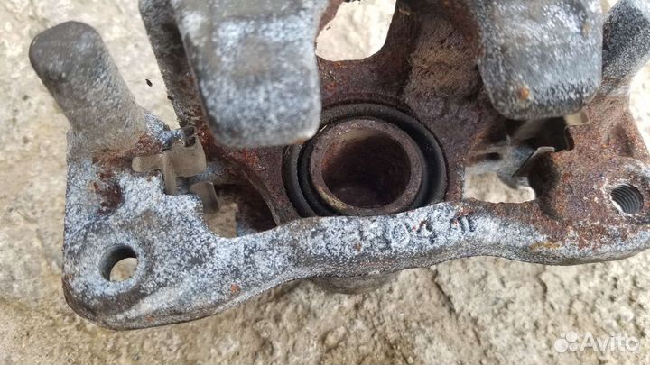 Суппорт mitsubishi lancer