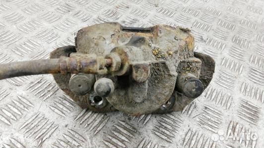 Суппорт тормозной передний левый mazda 3 2 (91L25K