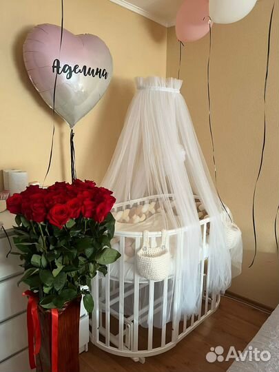 Детская кроватка с маятником