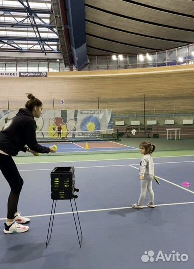 Тренер по большому теннису