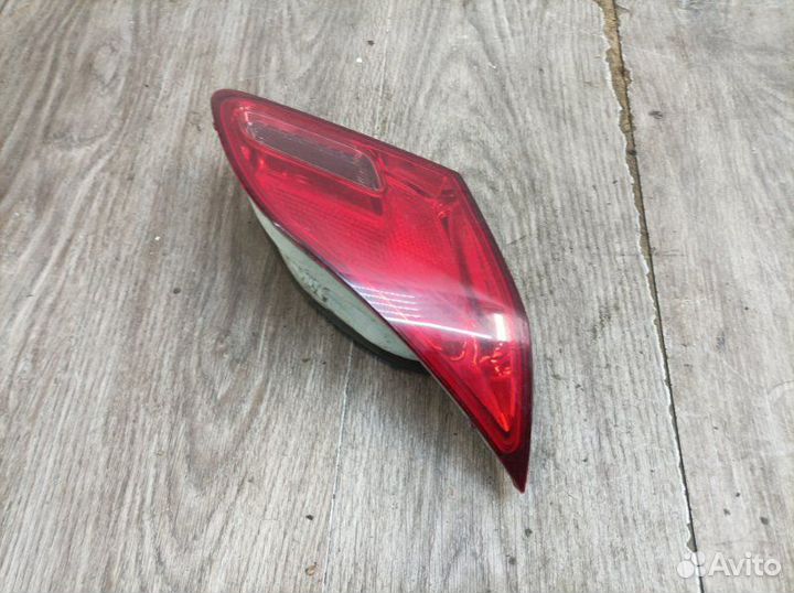 Фонарь крышки багажника задний левый Opel Astra J