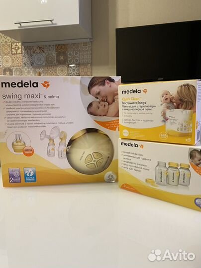 Молокоотсос двойной medela swing maxi