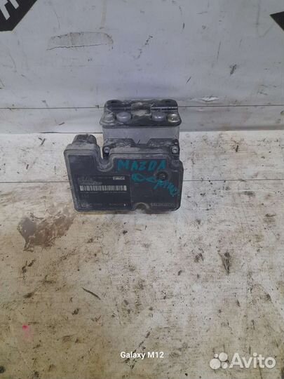 Блок ABS Mazda Demio de