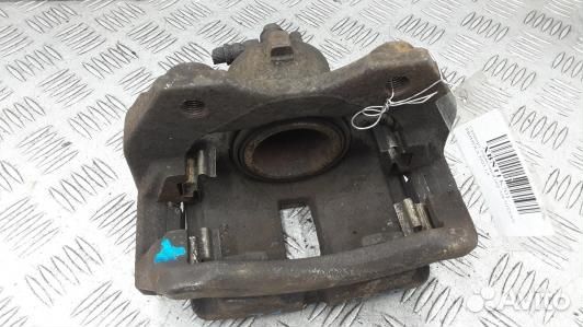 Суппорт тормозной передний левый nissan primera P1