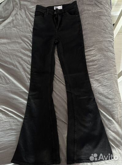 Джинсы клеш