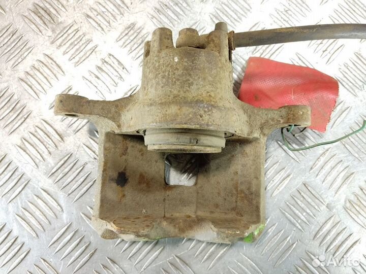 Суппорт передний правый Mitsubishi Lancer 10