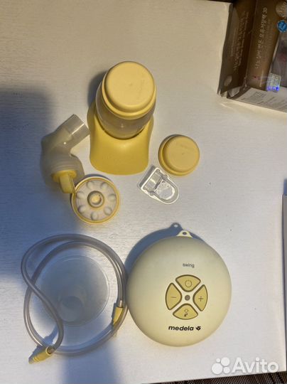 Молокоотсос medela электрический