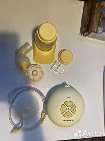 Молокоотсос medela электрический